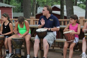 Brian Krug drumming with campers